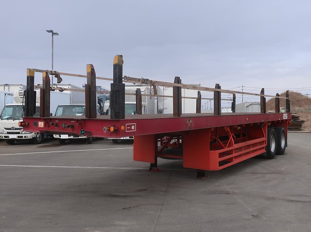 1995 Yusoki 2-axle chopping board semi-trailer with a maximum payload of 27.4 tons. Valid until January 2017.