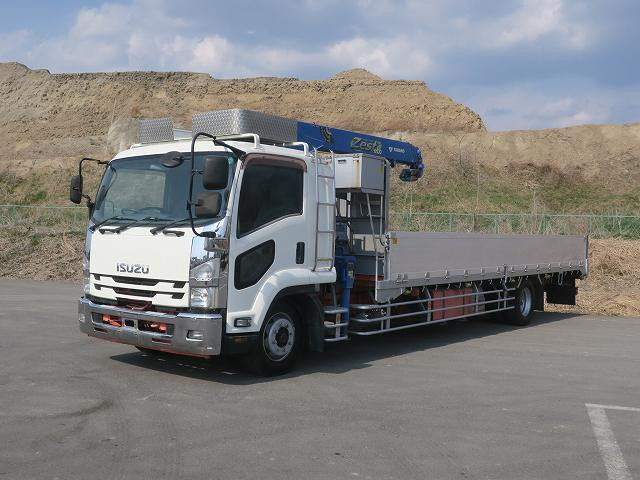2015 Isuzu Forward, increased payload capacity, flatbed with crane, Tadano 4-stage cranes, radio control, 7700 body, 260 horsepower, rear air suspension, retarder.
