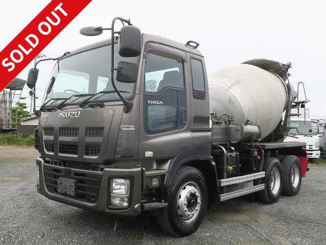 2011 Isuzu Giga large concrete mixer truck with 2 differentials, Kayaba drum capacity 8.7m3, electric hopper cover *Approximately 450,000km on meter/vehicle inspection valid until November 2013*