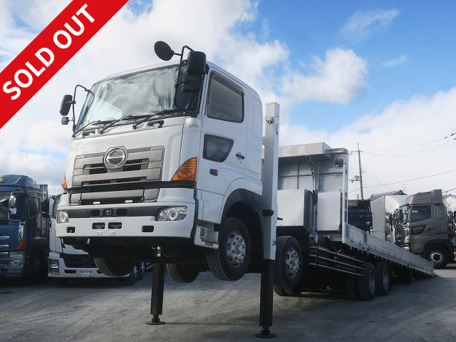 2009 Hino Profia Large Self-Loader with 4-Axle Low-Floor, Fujita High Jack, Walking Board, and Winch. Approximately 520,000 km on the odometer.