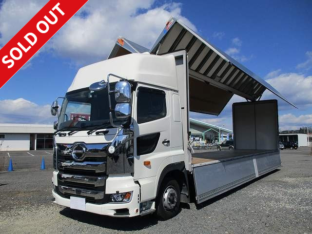 Now leased! 2017 Hino Profia, 4-axle low-floor, large aluminum wing, high roof, rear air suspension, retarder included, dealer record book included